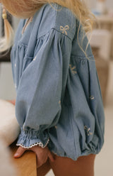 NOELLE ROMPER - DENIM BOWS